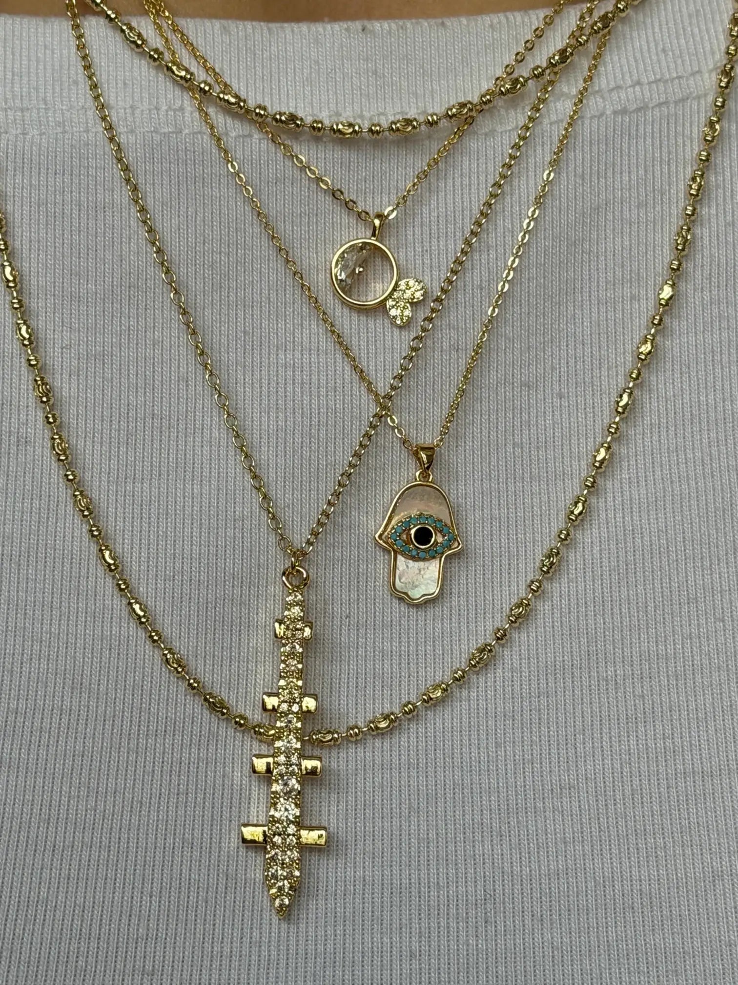 STANZA Layered Symbolic Necklace Set - Hamsa, Cross & Celestial Collection